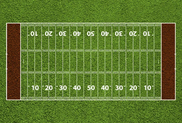 American football field with hash marks and yard lines. Grass te