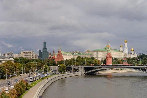 Kremlin embankment at the Moscow center with the Kremlin and Moskva river, view from bridge near Cathedral of Christ
