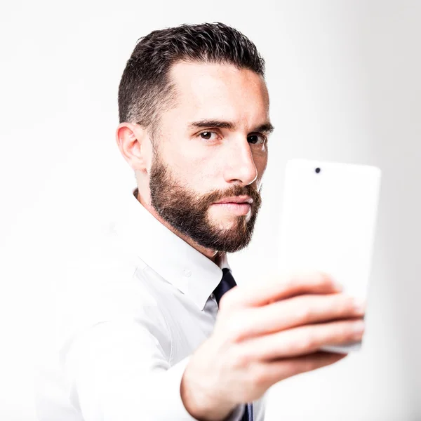 Businessman with smartphone solving the whole thing