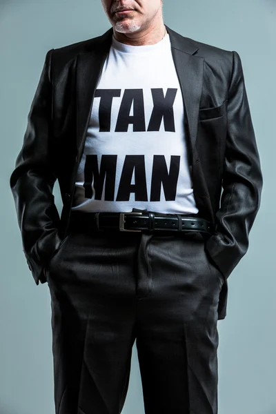 Stern man wearing a Tax Man t-shirt