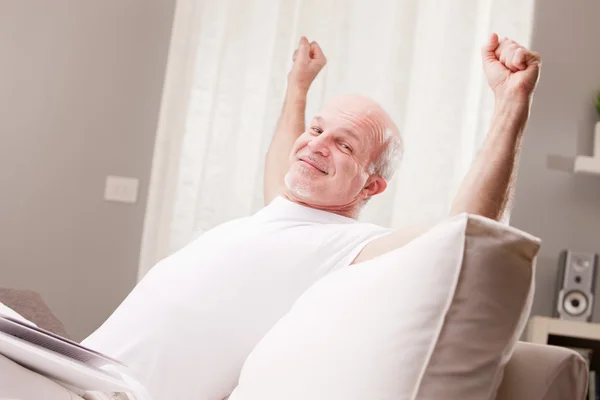 Man stretching and going asleep