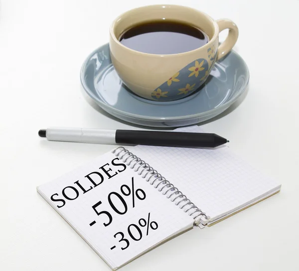 Cup of coffee with writing book sales