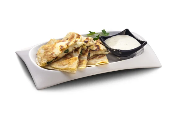 Flat bread stuffed with cheese and herbs