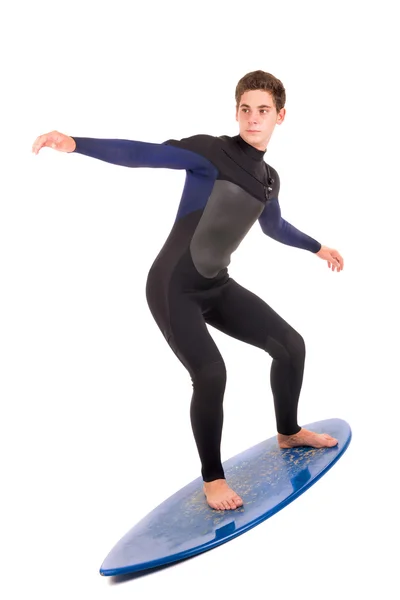 Teenager with surfboard on white