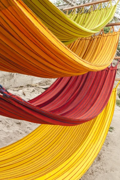 Multi-color hammocks in little village market place in Ecuador