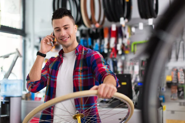 Salesman in bicycle shop