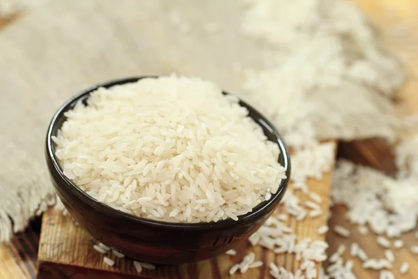 Bowl of raw rice grains