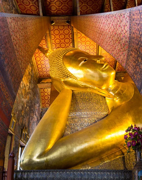 Reclining Buddha Gold Statue at Wat Pho, Bangkok, Thailand