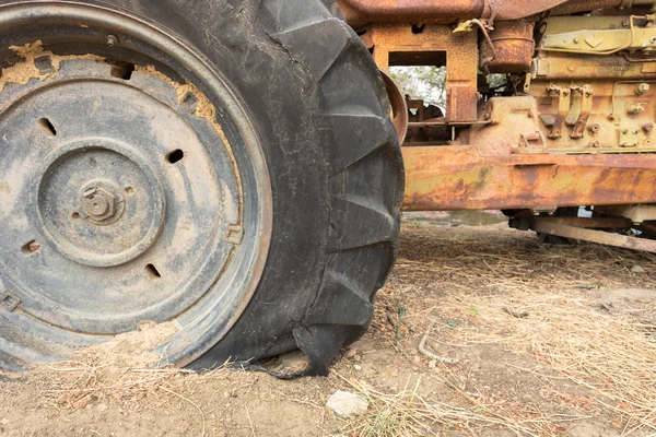 Leak tractor wheel, which is old tire