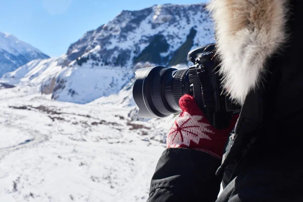 Sucessfull travel photographer in polar jacket