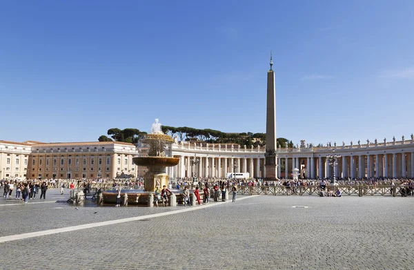 Tourists at Saint Peter\'s Square in Vatican City, Vatican. Saint Peter\'s Square is among most popular pilgrimage sites for Roman Catholics.