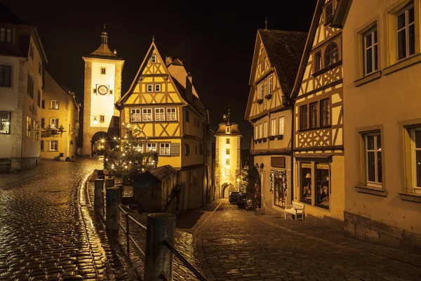 Street View of Rothenburg ob der Tauber at the evening. It is well known medieval old town, a destination for tourists from around the world.