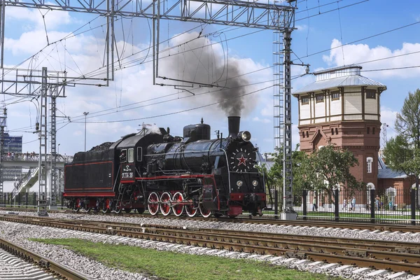 Demonstration of restored vintage locomotives in Moscow. Steam locomotive series er-774-38 rides