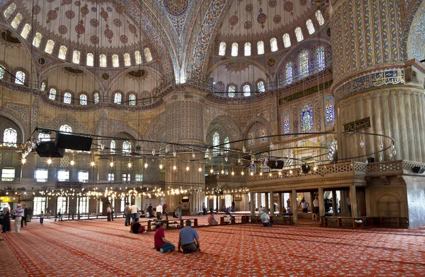 Internal view of Blue Mosque and believers