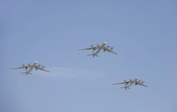 The span of three strategic missile-carrying bomber Tu-95MS   (Bear) at the parade devoted to 65th anniversary of Victory Day