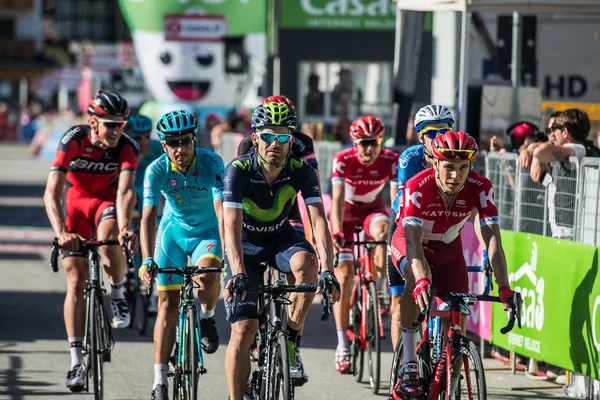 Corvara, Italy May 21, 2016; Professional cyclists  pass the finish line in Corvara