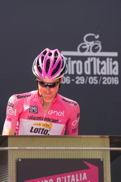 Muggi, Italy May 26, 2016; Steven Kruijswijk in pink jersey, team Lotto, to the podium signatures before the start of  the stage.