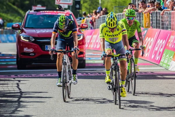 Risoul, France May 27, 2016; A group of professional cyclist exhausted with Rigoberto Uran and Alejandro Valverde passes the finish line after a hard mountain stage