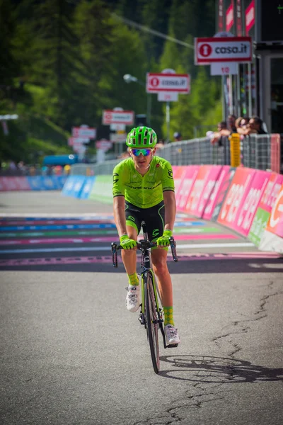 Risoul, France May 27, 2016; Professional Cyclist exhausted passes the finish line after a hard mountain stage