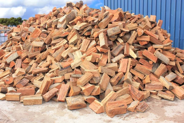 Split and chopped fire wood pile