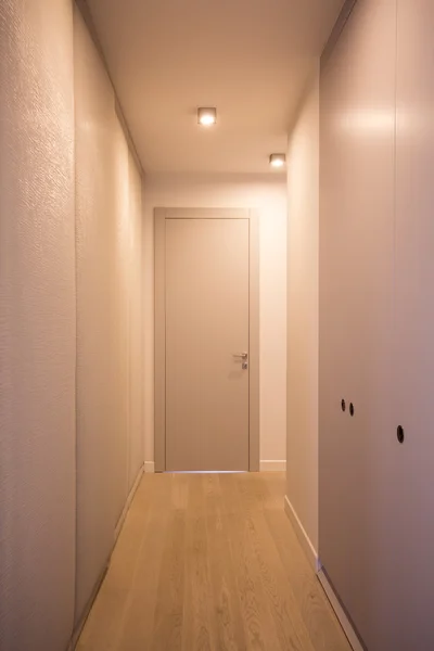 Narrow apartment corridor