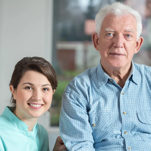 Disabled man and social welfare worker