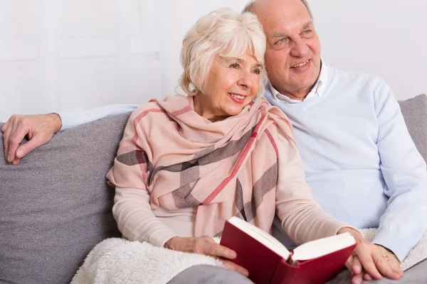 Reading together in evening at home