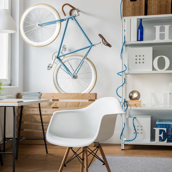 Modern chair in the middle of studio room