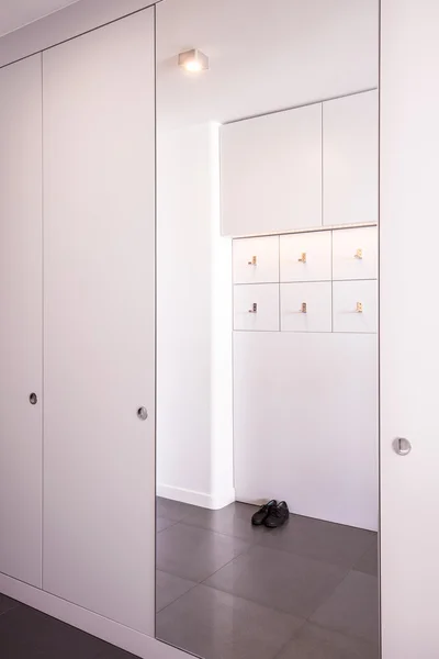 White big closet with mirror