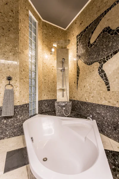 Marvellous stone bathroom resembling baths of Far East