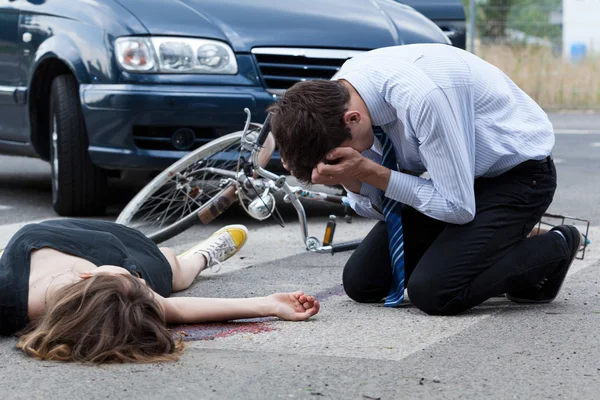 Dead woman on the pedestrian crossing