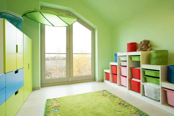 Room with green painted walls