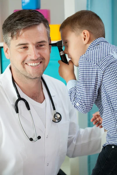 Pediatrician with patient