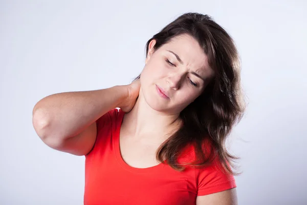 Young woman with stiff neck