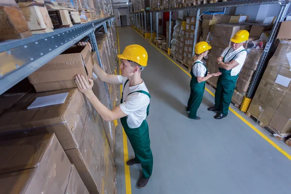 Plant workers in warehouse