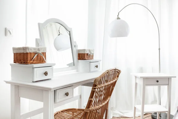 White dressing table with wicker elements