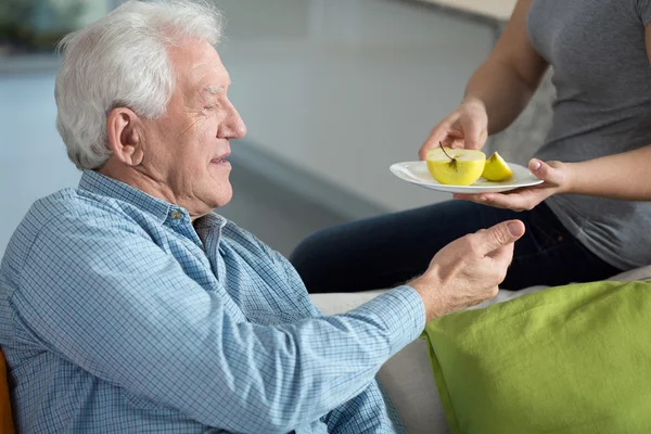 Daughter caring about senior father