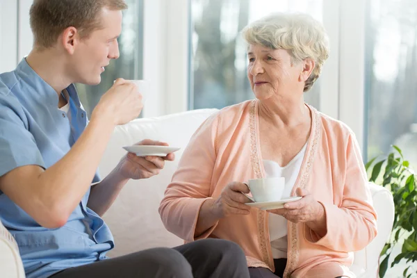 Elder woman and male nurse