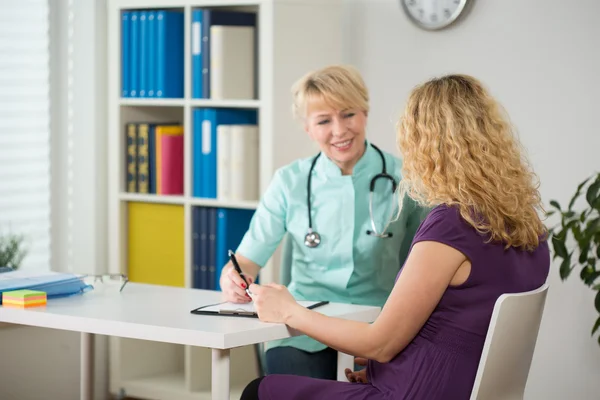 Pregnant woman during medical appointment