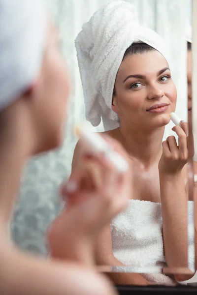 Woman Using lip balm