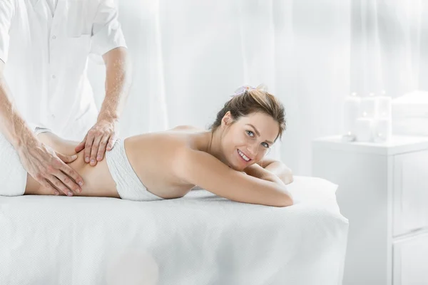 Modern female in massage salon