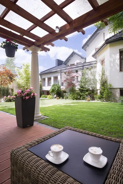 House patio with rattan table