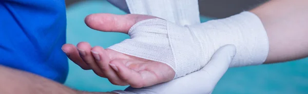 Bandage on wounded hand