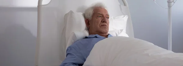 Elder hospice patient in bed