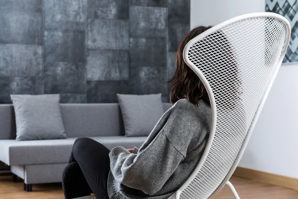 Woman relaxing in stylish room