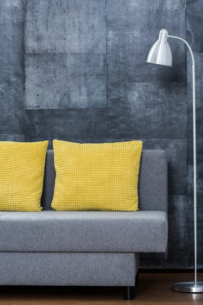 Simple sofa with yellow pillows