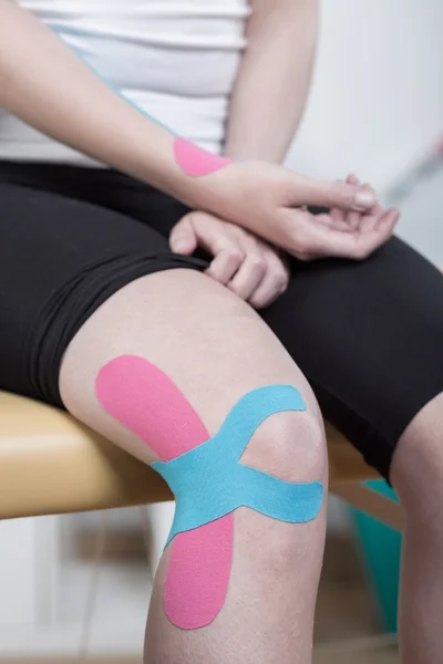 Knee taped with kinesio tape