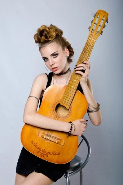 Girl playing the guitar