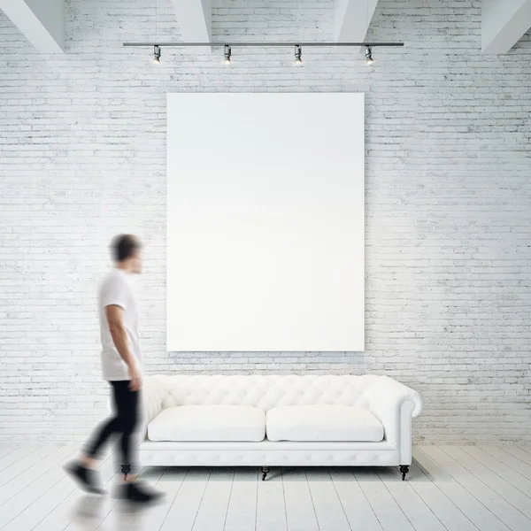 Man in gallery waching canvas