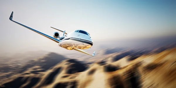 Photo of white Business generic design Private jet flying in blue sky at sunrise.Uninhabited desert mountains background.Luxury travel picture. Horizontal,motion blurred effect. 3d rendering